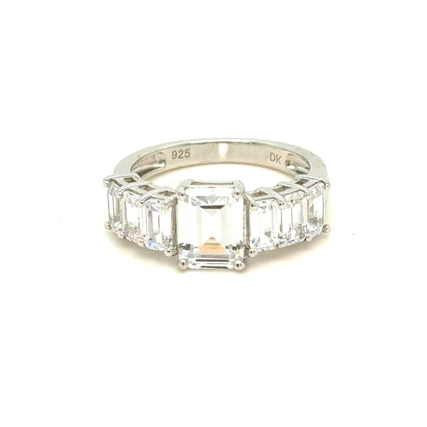 Sparkling 925 Silver Emerald Cut CZ’s Ring